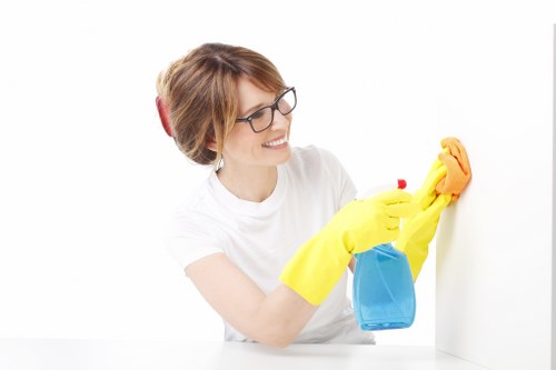 Bedroom cleaning with organized bedding and dust-free surfaces
